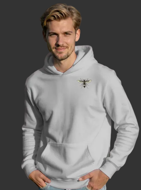 Man wearing a light gray hoodie with a logo on a white background
