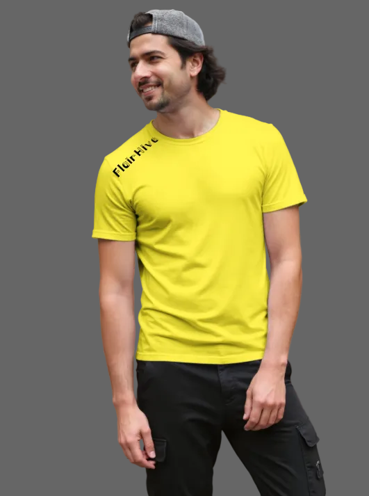 Man wearing a yellow t-shirt with 'Five' branding outdoors.